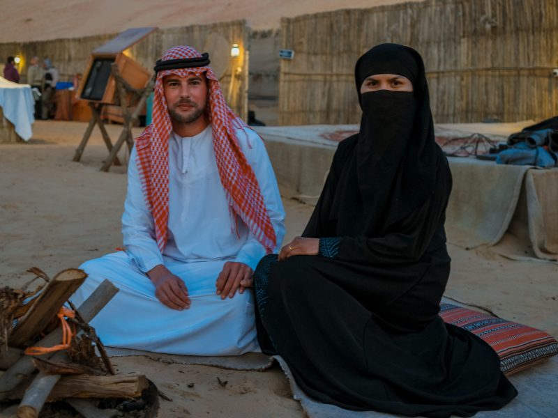 Couple Arabic clothes during Dubai desert safari at the safari camp, Dubai United Arab Emirates